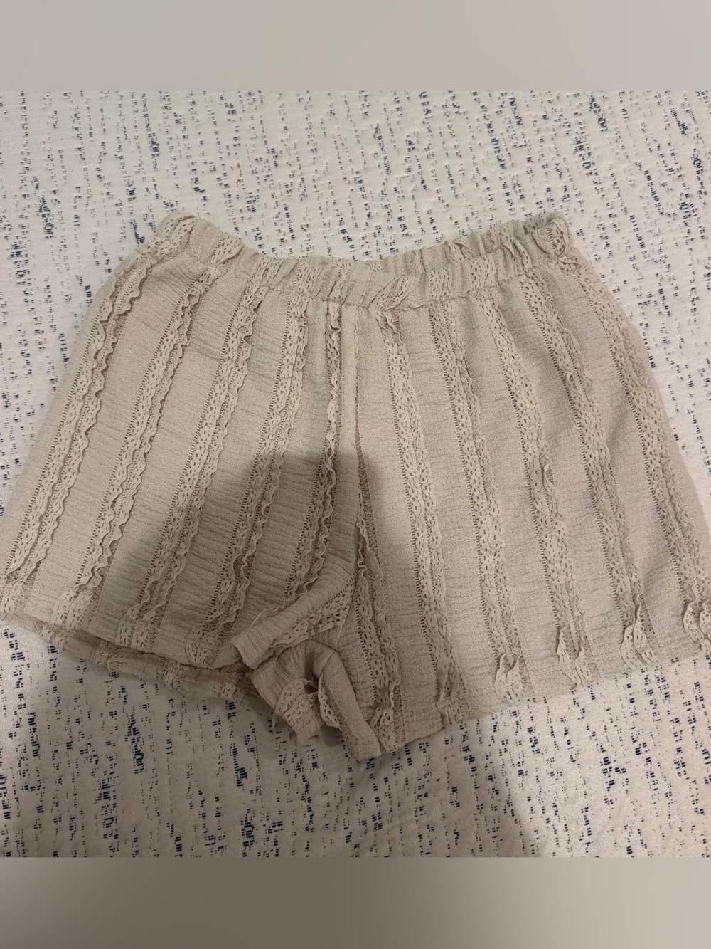 Tan ruffle mini shorts
